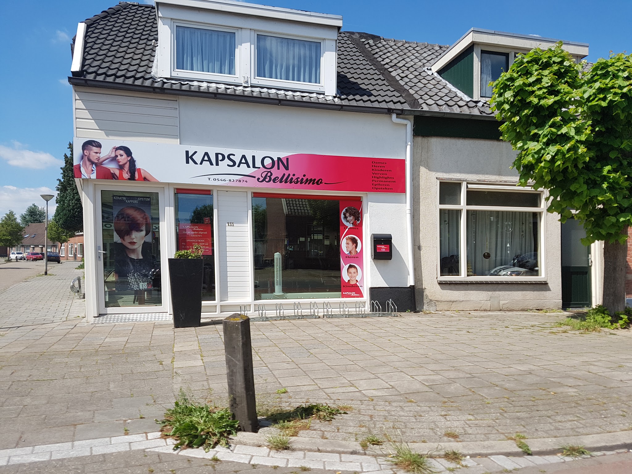De winkelgevel van Kapsalon Bellisimo aan de Nieuwstraat 133 in Almelo